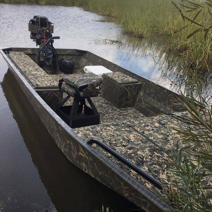 Custom Mud Boat in the water